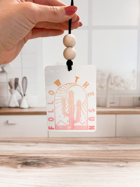 Follow The Sun Car Charm
