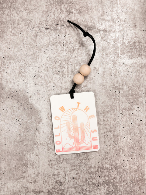 Follow The Sun Car Charm